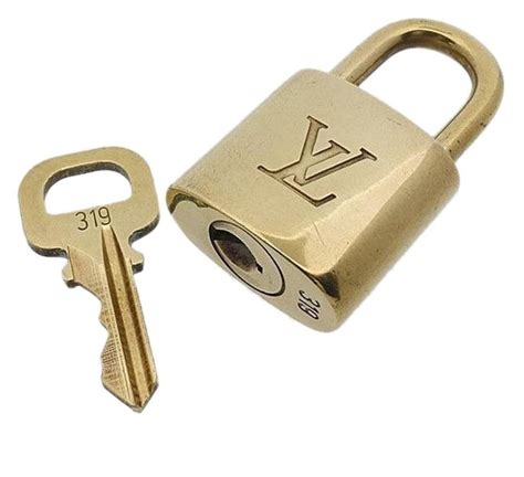 louis vuitton lock and key silver|authentic louis vuitton lock key.